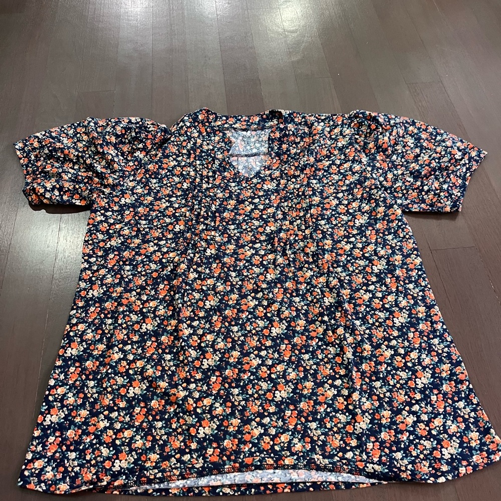Women's V-neck blouses. Size XL, but fits like L